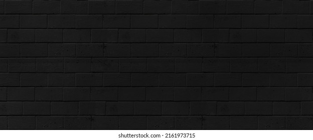 Abstract Black brick wall texture for pattern background. wide panorama picture. High quality photo