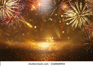 Abstract Black And Gold Glitter Background With Fireworks. Christmas Eve, 4th Of July Holiday Concept