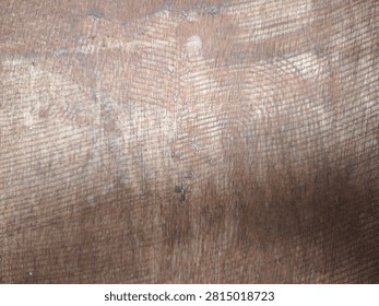 Abstract black scratched surface texture with subtle wear marks and fine random scratches. This high-resolution dark background features a rough, distressed appearance that creates a modern industrial and grunge aesthetic. The textured black surface is ideal for use as a backdrop in graphic design, website backgrounds, product presentations, posters, banners, packaging, advertising, and creative digital artwork. The natural imperfections and weathered details provide depth, character, and an authentic vintage feel while maintaining a minimalist monochrome style. Suitable for overlays, wallpaper, mockups, templates, social media graphics, branding materials, and artistic compositions. This versatile abstract texture can represent aged metal, painted concrete, worn plastic, stone, or industrial materials, making it perfect for both commercial and editorial design projects. The neutral dark tones allow text, logos, and design elements to stand out while adding visual interest without distraction. High-quality abstract background with realistic surface details, scratches, and distressed patterns for professional creative applications.