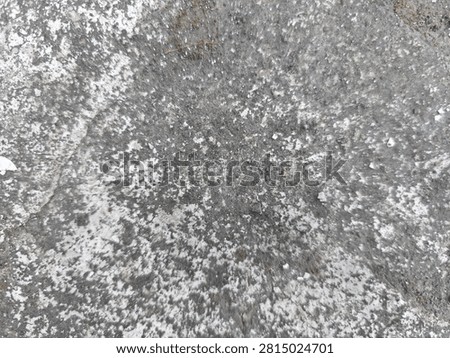 Abstract black scratched surface texture with subtle wear marks and fine random scratches. This high-resolution dark background features a rough, distressed appearance that creates a modern industrial and grunge aesthetic. The textured black surface is ideal for use as a backdrop in graphic design, website backgrounds, product presentations, posters, banners, packaging, advertising, and creative digital artwork. The natural imperfections and weathered details provide depth, character, and an authentic vintage feel while maintaining a minimalist monochrome style. Suitable for overlays, wallpaper, mockups, templates, social media graphics, branding materials, and artistic compositions. This versatile abstract texture can represent aged metal, painted concrete, worn plastic, stone, or industrial materials, making it perfect for both commercial and editorial design projects. The neutral dark tones allow text, logos, and design elements to stand out while adding visual interest without distraction. High-quality abstract background with realistic surface details, scratches, and distressed patterns for professional creative applications.