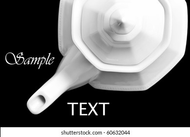 Abstract Black And White Photo Of Coffee Or Tea Pot From Above.  Isolated On Black With Copy Space.