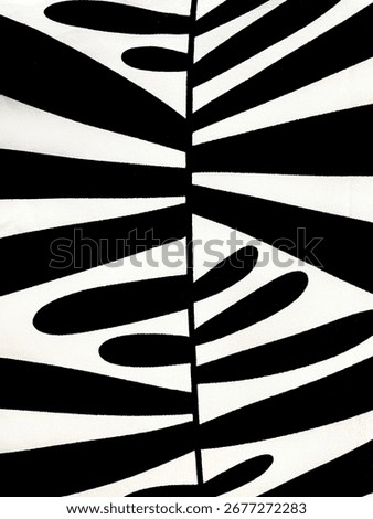 Abstract black and white textile pattern with bold geometric and organic shapes. Modern minimal design resembling leaves or zebra stripes, perfect for fabric, wallpaper, fashion, interior decoration