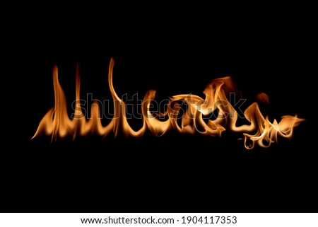 Abstract blaze fire flame texture for banner background
Texture of fire flames  on a black background. Real fiery bonfire for creative design elements.