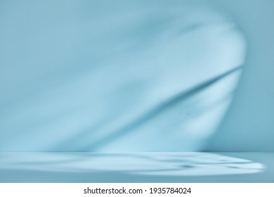 Abstract blue background with drop shadow and light. Backdrop for product presentation