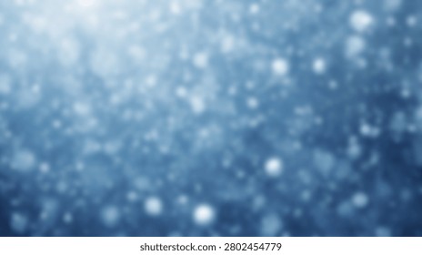 An abstract blue background featuring soft bokeh lights and falling snowflakes, with subtle light rays creating a wintery atmosphere.