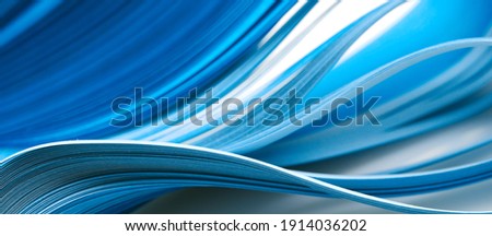 Abstract blue color wave curl strip paper long horizontal background. 