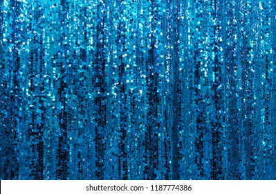 Abstract Blue Glitter Background. Festive Background With Copy Space, Hanging Curtain. Beautiful Sparkling Sequined Texture. Holiday Wallpaper Or Web Banner