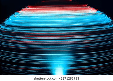 Abstract blue light trails on the blue background, motion blur effect
