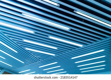 Abstract Blue Line Pattern Ceiling. Geometric Hitech Office Interior.