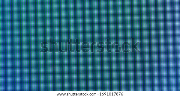 Abstract blue pixel\
background with smooth blurred transition. Macro photography on a\
large scale