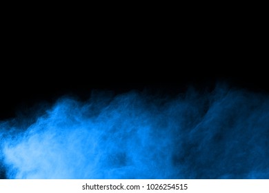abstract blue powder splatted background,Freeze motion of color powder exploding/throwing color powder,color glitter texture on black background. - Shutterstock ID 1026254515