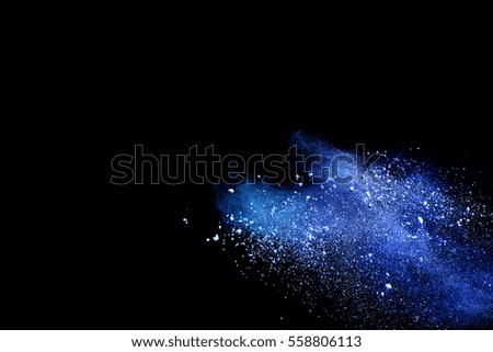 abstract blue powder splatted background,Freeze motion of color powder exploding/throwing color powder, blue glitter texture