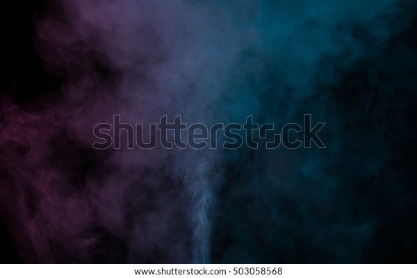 Abstract blue purple water vapor on a black\
background. Texture. Design elements. Abstract art. Steam the\
humidifier. Macro\
shot.