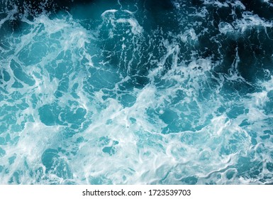 Abstract blue sea water and white wave for background