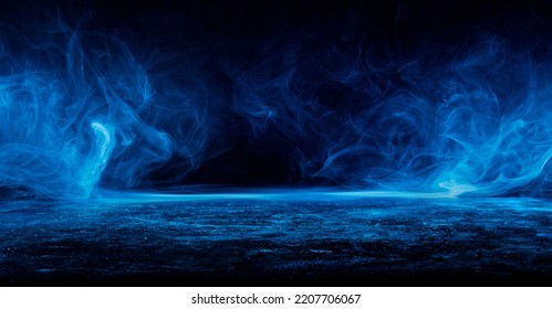 Abstract blue smoke moves on black background.Beautiful swirling blue smoke. Mockup for your logo. Wide angle horizontal wallpaper or web banner.