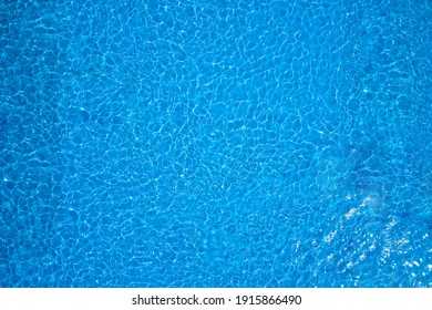 Abstract blue water surface background texture - Shutterstock ID 1915866490