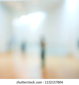 Abstract Blur Background With Bokeh Of Art Gallery Or Museum.