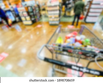 Abstract Blur Background Of Grocery Store Cart At Checkout Lane. 
