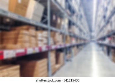Abstract blur background of inside of warehouse with pallet on high shelf
