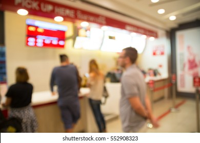 Abstract Blur Background People Wait to Order food and make Payment in Fastfood Store or Selfservice Restaurant