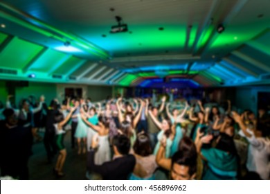 abstract blur background of wedding after party at night with nightclub style