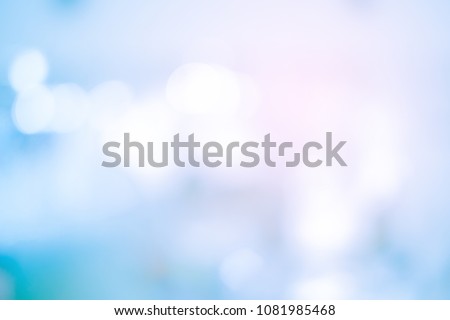abstract blur blue gradient color background with orange light filter effect 