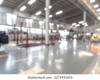 Abstract blur car garage automobile interior. Blurred mechanic service centre auto repair workshop, soft defocused. Blurry car care station background. - Shutterstock ID 2271931655