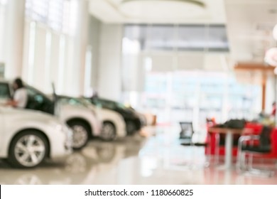 Abstract Blur Of Car In The Showroom Background