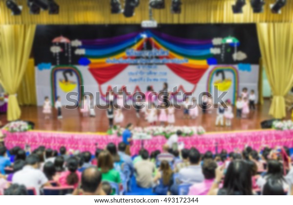 Abstract Blur Children Demonstrate Hall School Stock Image