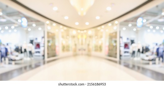 Abstract blur clothing boutique display interior of shopping mall background