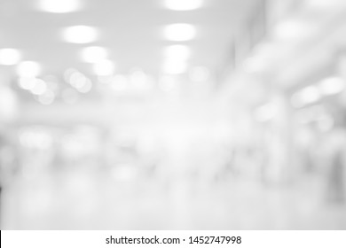 abstract blur corridor perspective indoor of opening hall background with bulbs light for design 