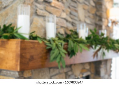 Abstract Blur Of Decorated Fire Place Mantle With Candles.