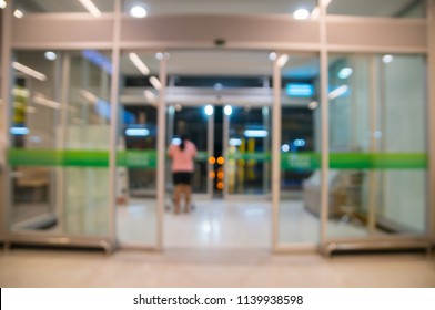 Abstract Blur Or Defocus Background Of Entrance Or Exit Gate Of Retail Shopping Department Store As Modern Retail Outlet Decoration.