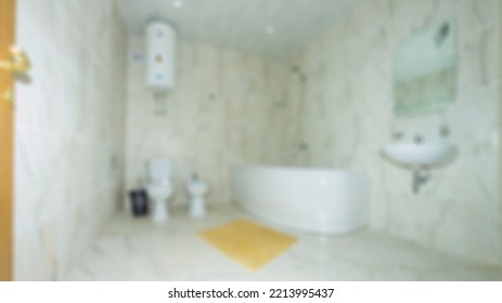 Abstract Blur Defocused Bathroom And Toilet Interior For Background.