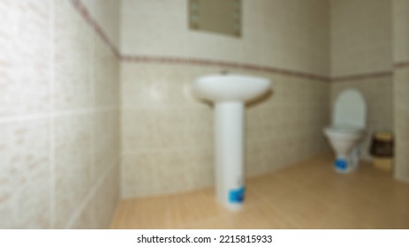 Abstract Blur Defocused Bathroom And Toilet Interior For Background.