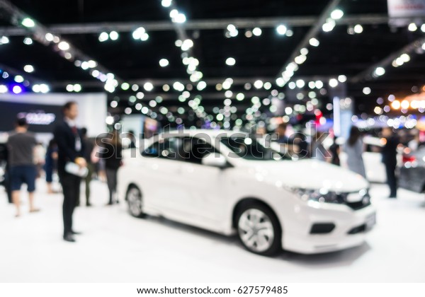 Abstract blur and defocused car and motor
exhibition show interior for
background