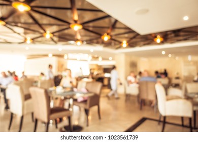 Abstract blur defocused restaurant and coffee shop interior for background - Vintage Filter - Shutterstock ID 1023561739
