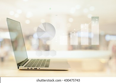 Abstract Blur Financial graph with laptop background