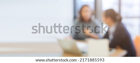 abstract blur group of manager businesswoman on marketing team talk and discuss about project in board room at office for business background concept