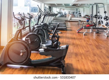 Abstract blur gym and fitness room interior for background