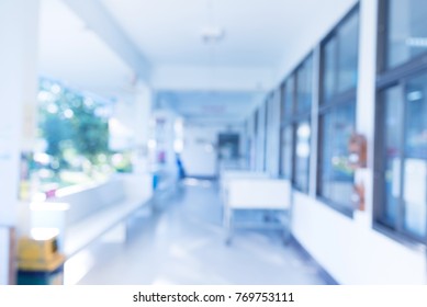 Abstract Blur Image Of Beds Patient In The Hospital With Bokeh For Background Usage.