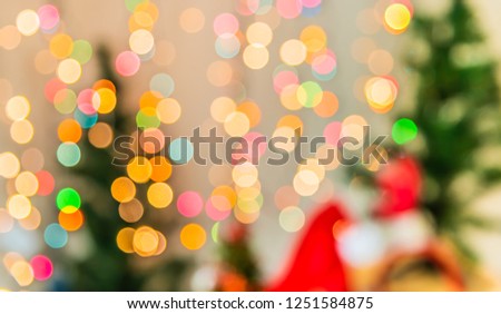 Abstract blur image of Christmas theme and oraments decoration with light for background usage .