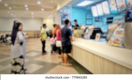 Abstract Blur Image Of Customer Oder Food At Fast Food Counter