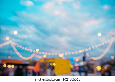 abstract blur image of food stall and food truck at day festival for background usage. (vintage tone) - Powered by Shutterstock