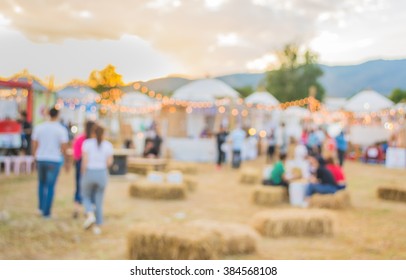 Abstract Blur Image Of Food Stall At Day Festival For Background Usage.