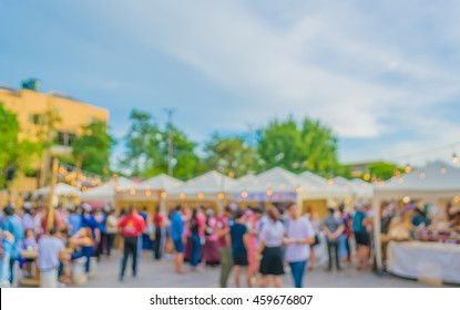 Abstract Blur Image Of Food Stall At Day Festival For Background Usage.