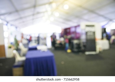 abstract blur image of inside white events tent  
