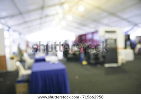 abstract blur image of inside white events tent  