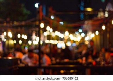 abstract blur image of night festival in a restaurant with bokeh for background 