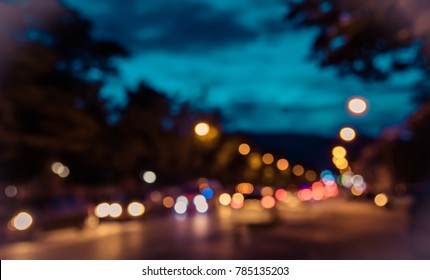 Abstract Blur Image Of  Road In Night Time With Bokeh For Background Usage .